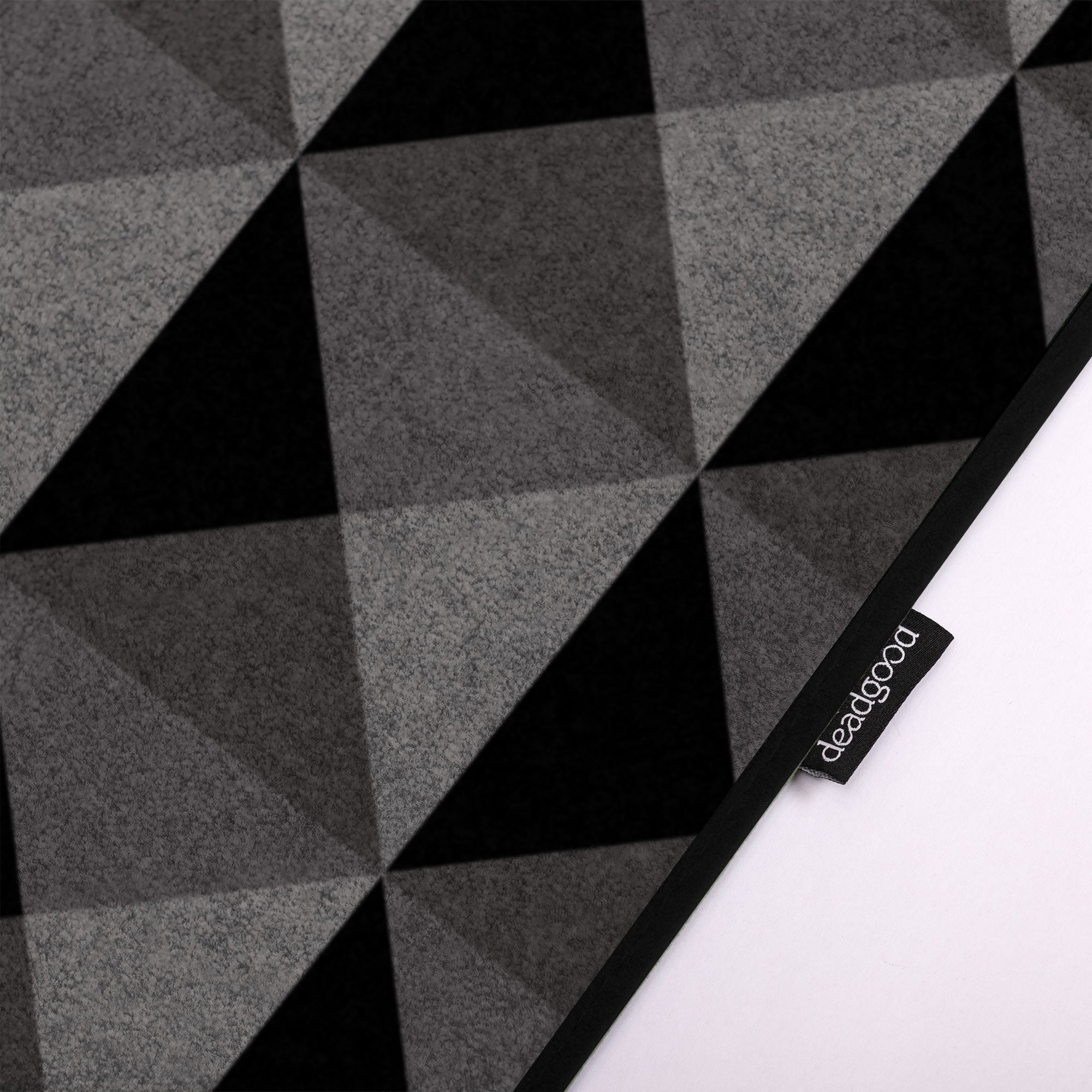 Detail of a subtle textural detail on rugs for luxury car showrooms.