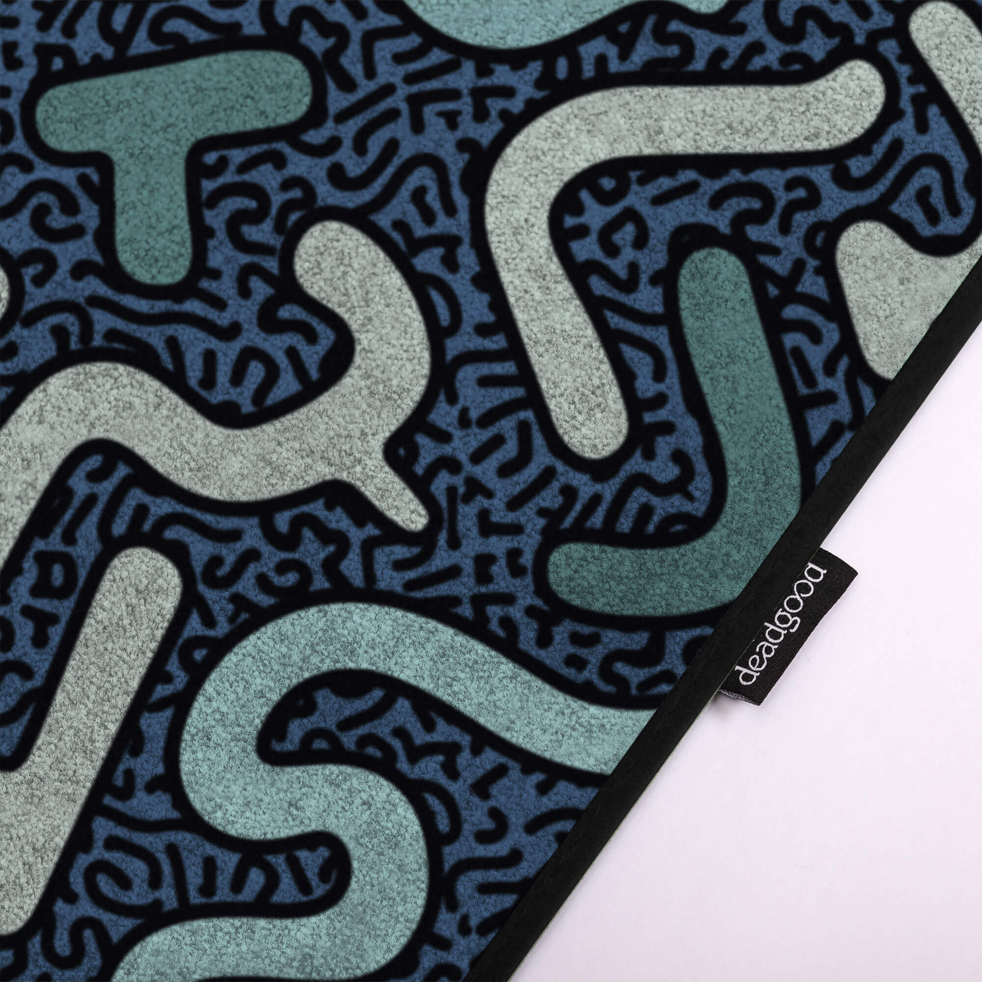 Detail of an abstract and colourful rug for creative design studios