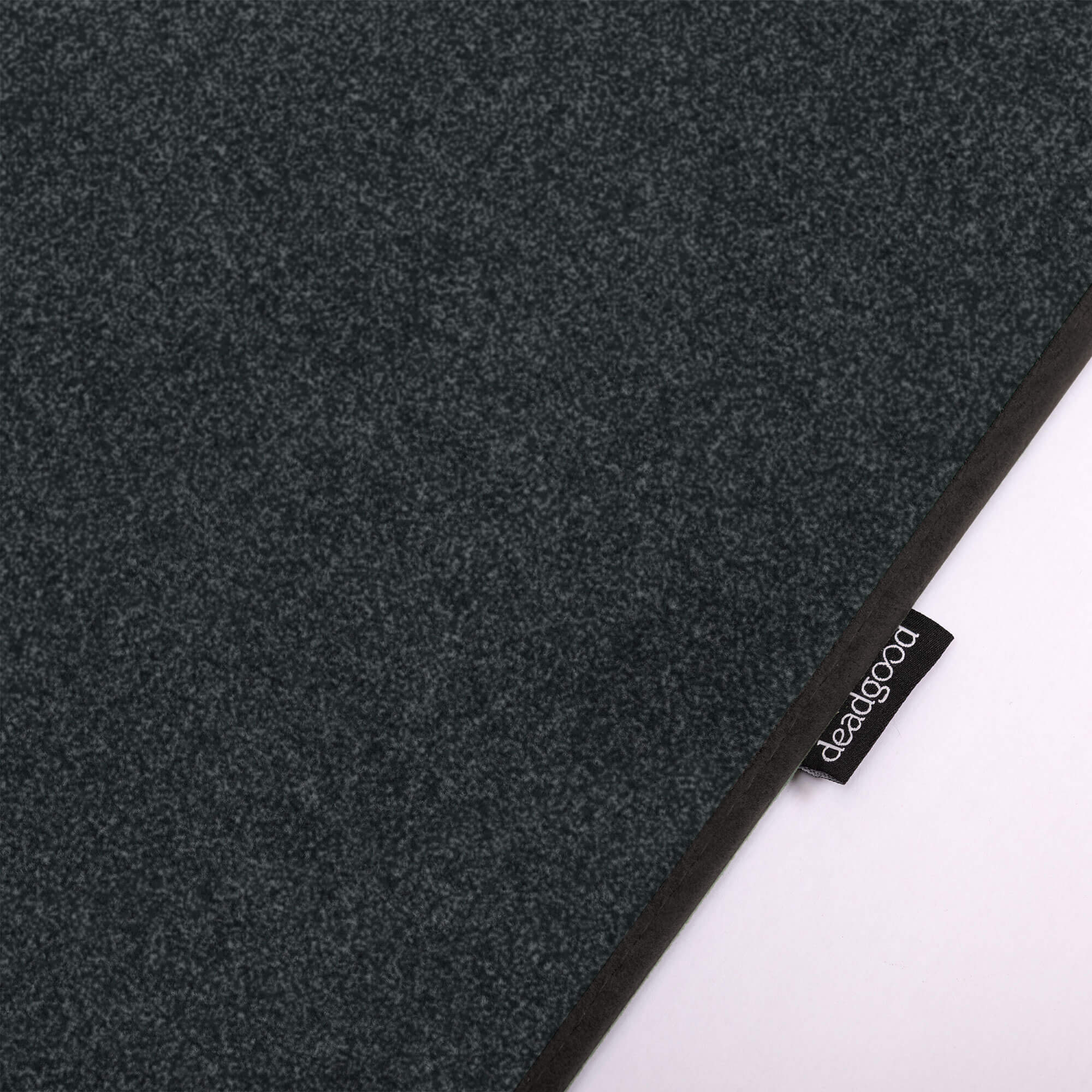 Detail of a subtle and plain textural rug for corporate boardrooms