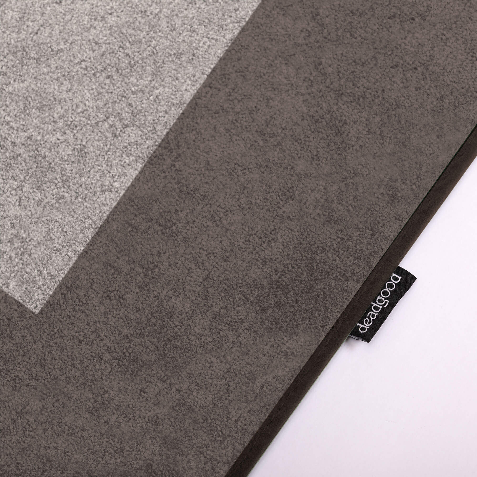 Detail of a stylish and bold rug for innovative tech lounges.
