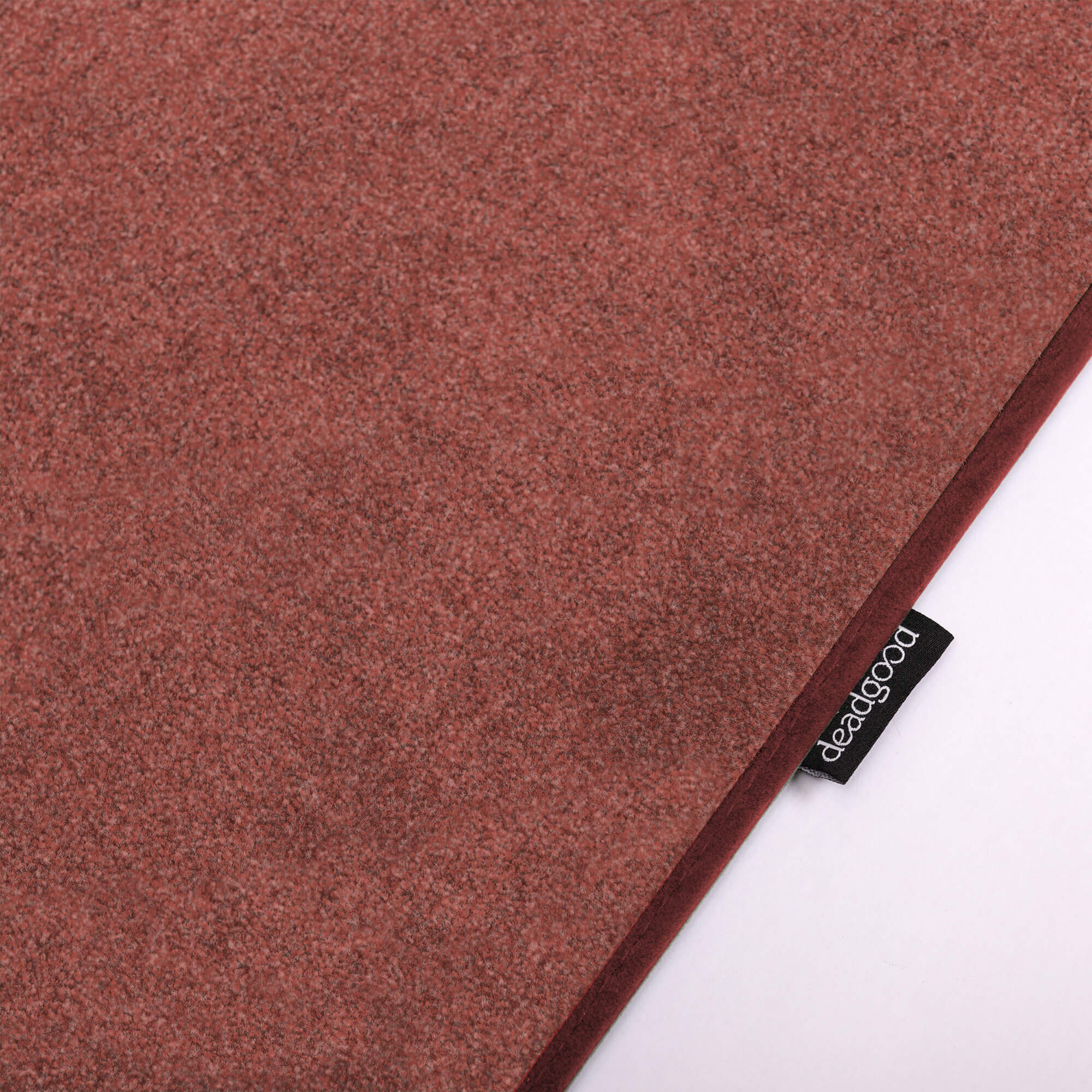 Detail of a subtle and plain textural rug for corporate boardrooms